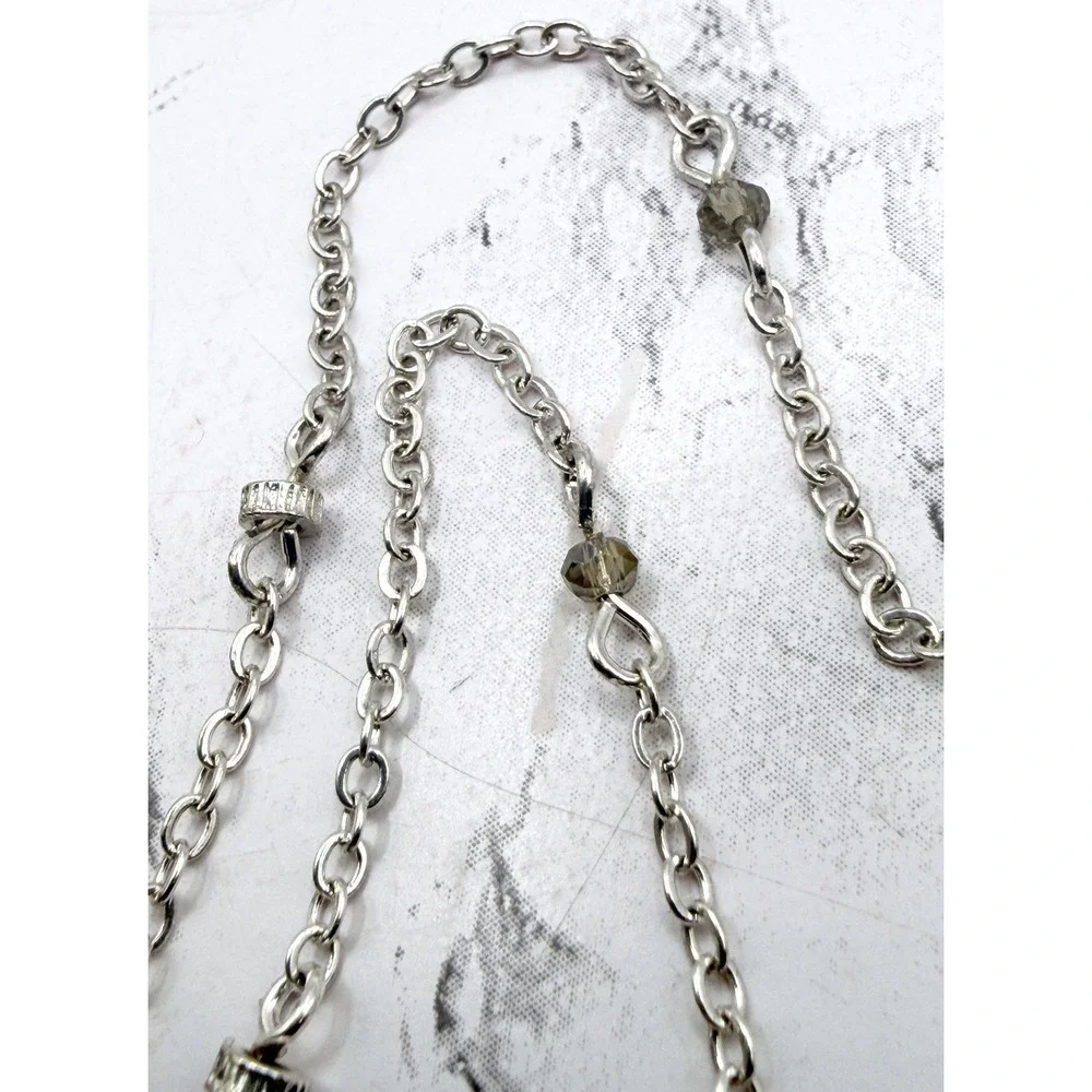 Source Unknown long silver